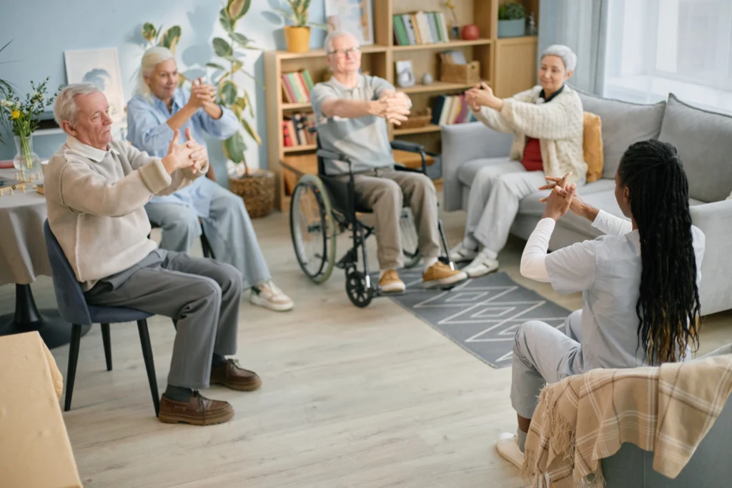 Seniors participating in a wellness activity in a ventilated room finished with low odor protective coatings.