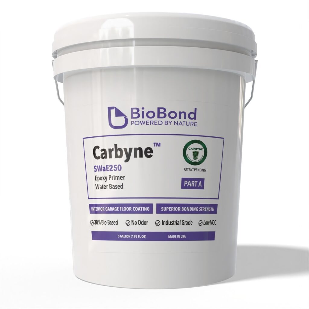 Carbyne™ SWaE250 water-based epoxy primer in a white pail for garage floor coating application preparation.